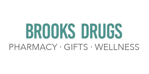 Brooks Drugs logo: 'BROOKS DRUGS' in teal with the tagline 'PHARMACY • GIFTS • WELLNESS' beneath.